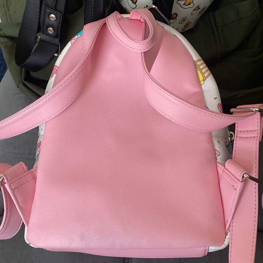 Loungefly Sanrio Cupcake Pattern Mini Backpack in White, Pink, Yellow, Blue - Picture 2 of 3